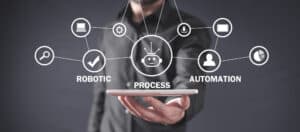 Person holding tablet with icons representing robotic process automation and workflow efficiency for small businesses.