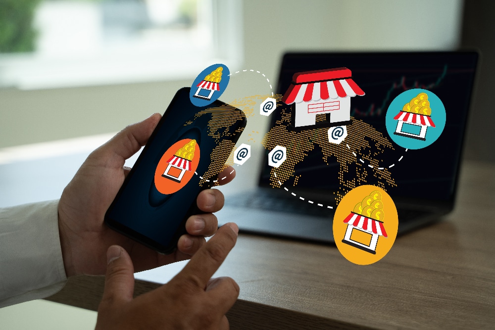 Person holding smartphone displaying local business icons and map, emphasizing local digital marketing strategies for small businesses in 2024.